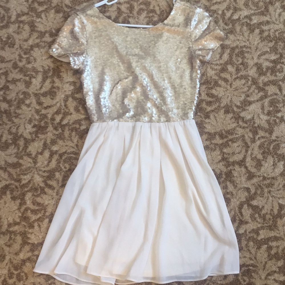 Gold, fit and flare dress.